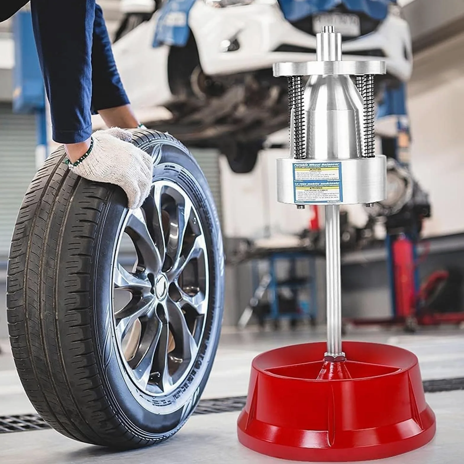 Soporte equilibrador manual de neumáticos, construcción de acero resistente para reparación de ruedas de automóviles y camiones ligeros